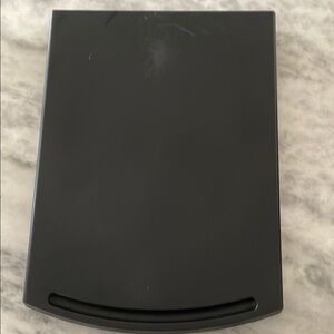 Sleek Black Device with Curved Design